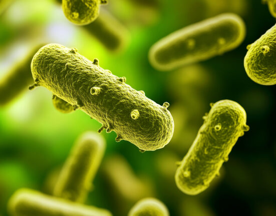 A scientific and medical concept focused on the microbiome, gut health, and microbiotic cells. The image highlights laboratory research, medicine, nutrition, and the role of probiotics like yogurt.
