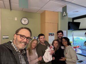Chase with his family and newborn grandchild.
