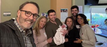 Chase with his family and newborn grandchild.