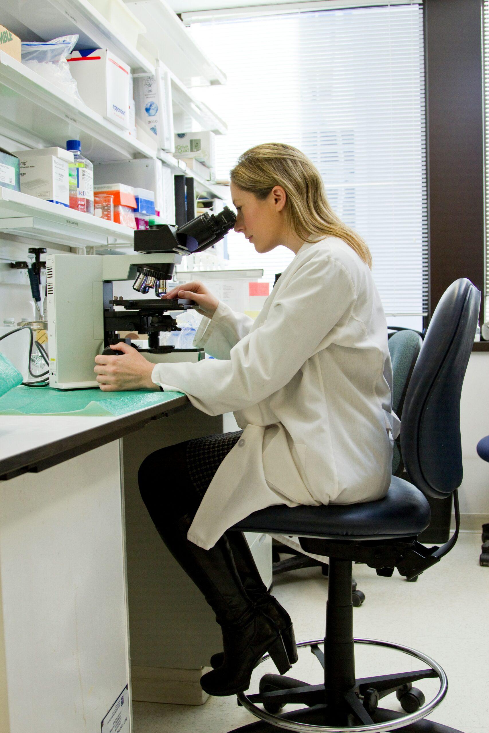 Doctor Inspecting Samples in Lab